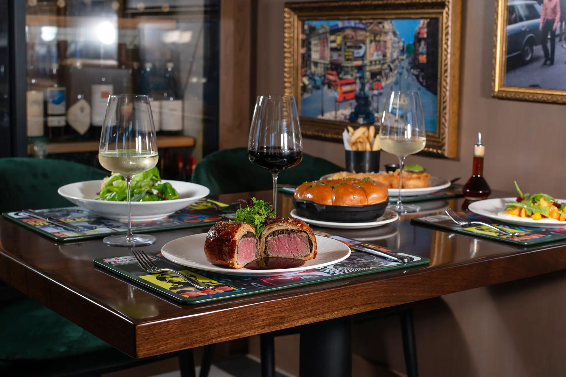 Beef Wellington with potato purée, fresh herb salad and red wine demi at Gordon Ramsay at The Carnaby.