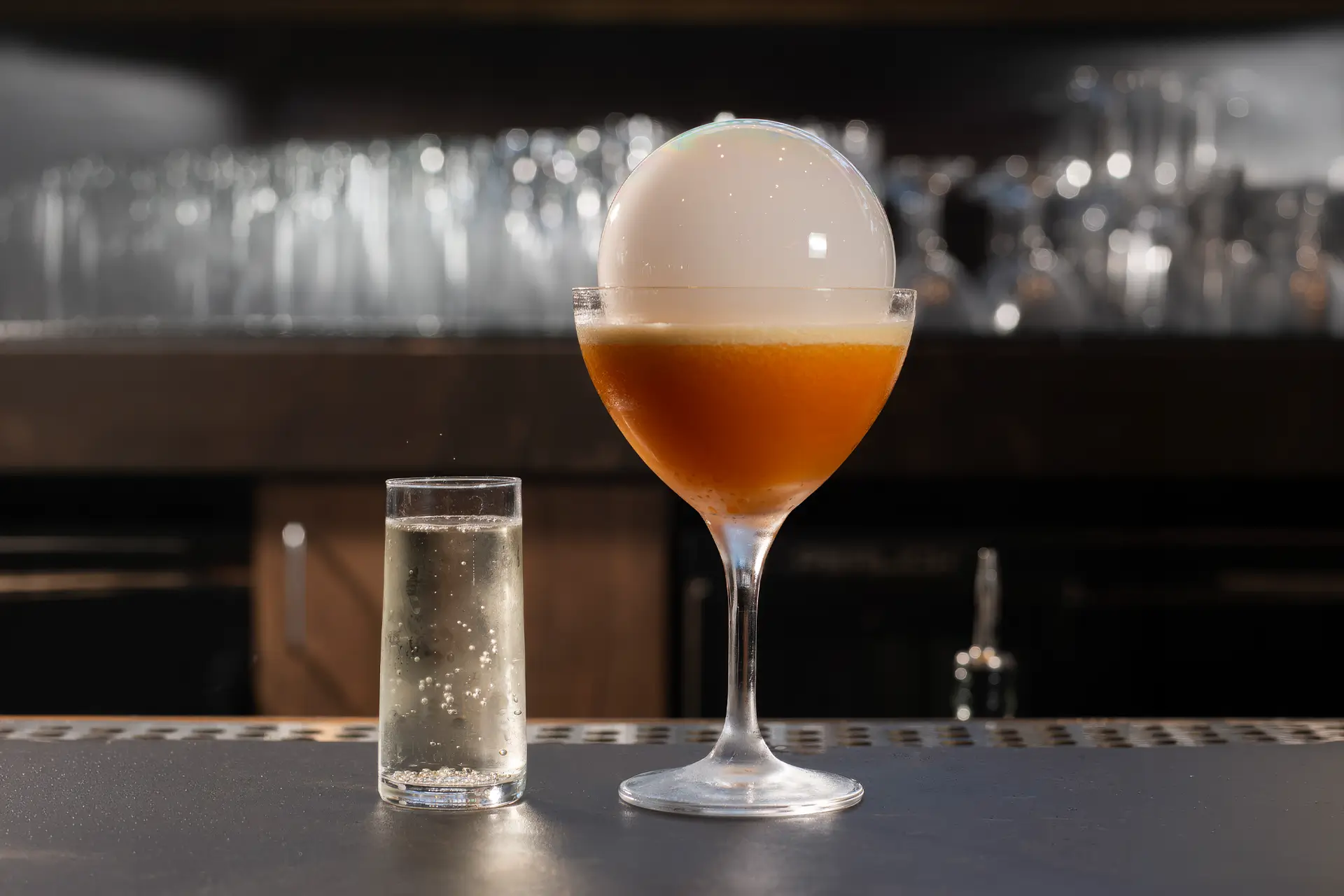 Passion Fruit Royale with vodka, passion fruit, vanilla, Prosecco and a passion fruit bubble at Gordon Ramsay at The Carnaby.